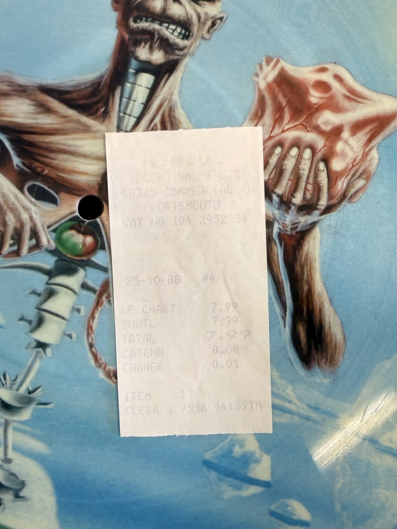 The UK picture disc from folder 15, with its original till receipt